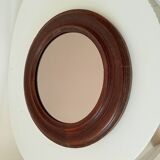 Antique round wooden mirror
