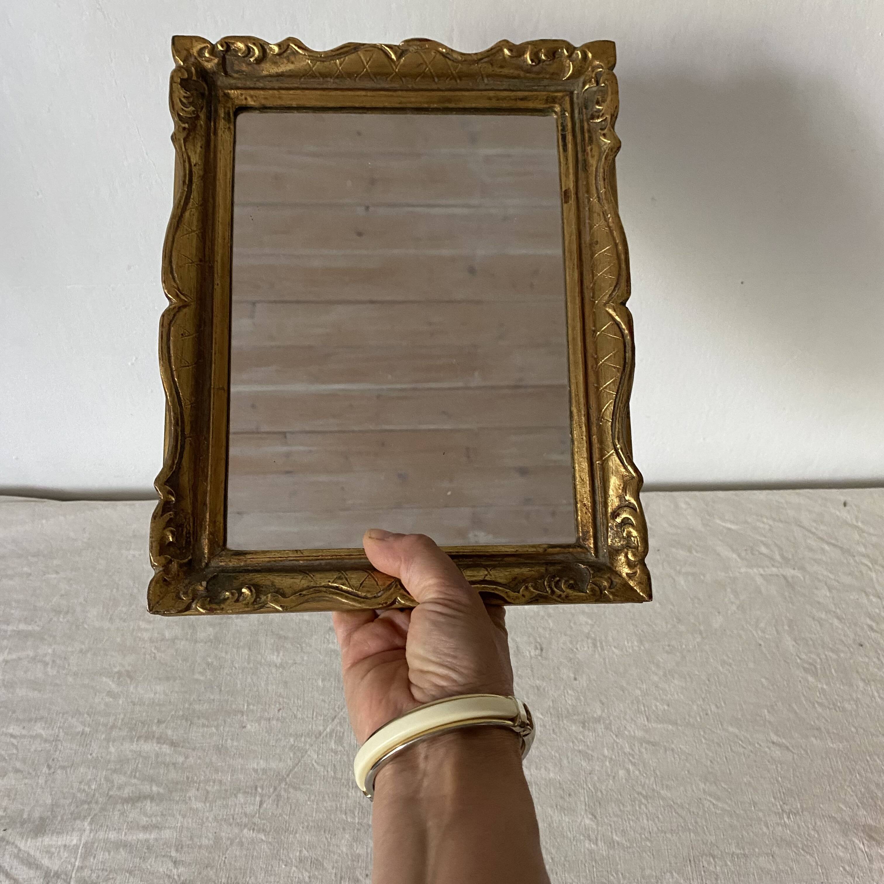 Small molded gilded mirror