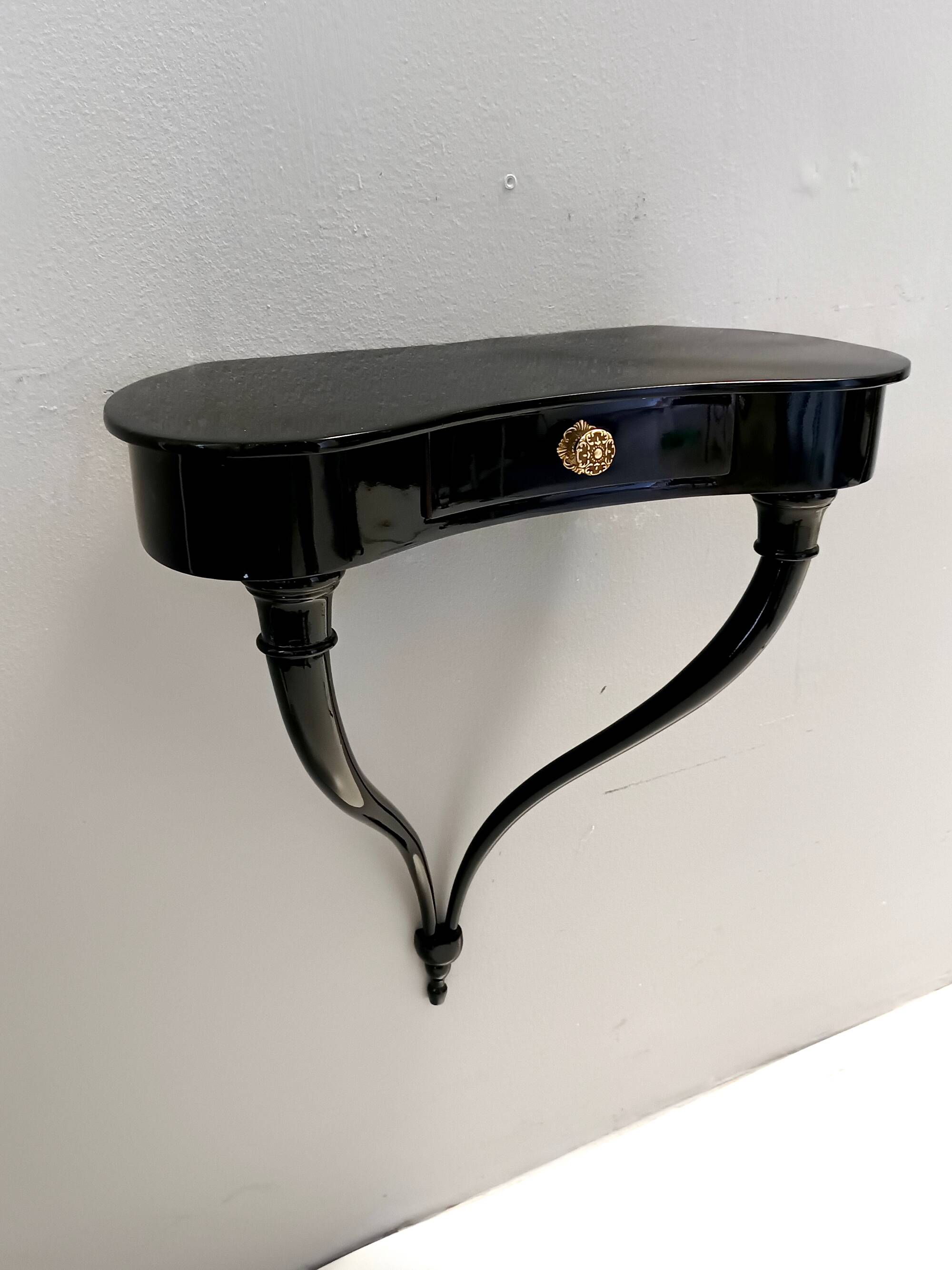 Pair of Black Wall-Mounted Console Tables / Nightstands attr. to Ulrich