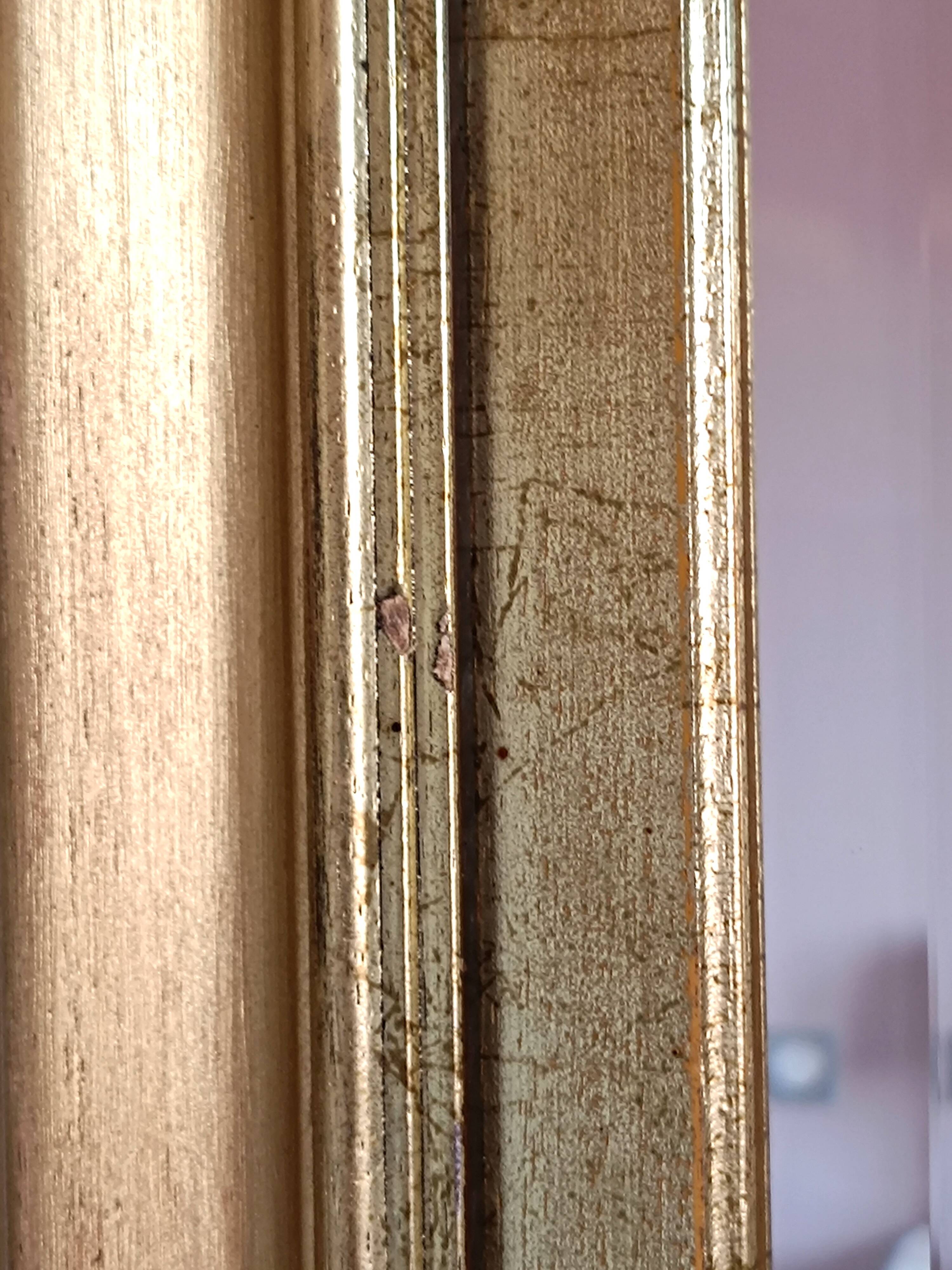 Octagonal gilded wooden mirror
