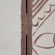Two-leaf screen depicting a historical figure and symbols