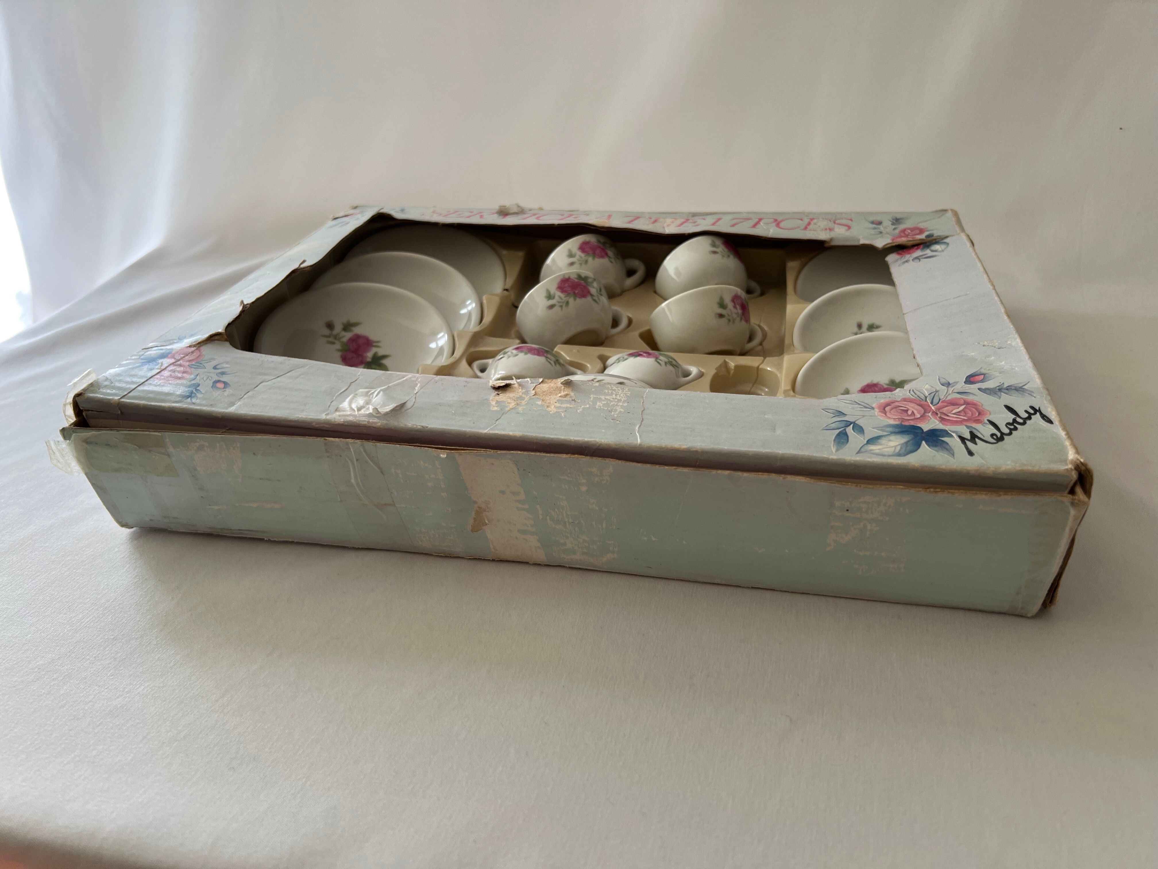 Miniature tea set with pink flowers for children