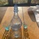 Liquor service consisting of a blue glass decanter and. 3 small antique glasses