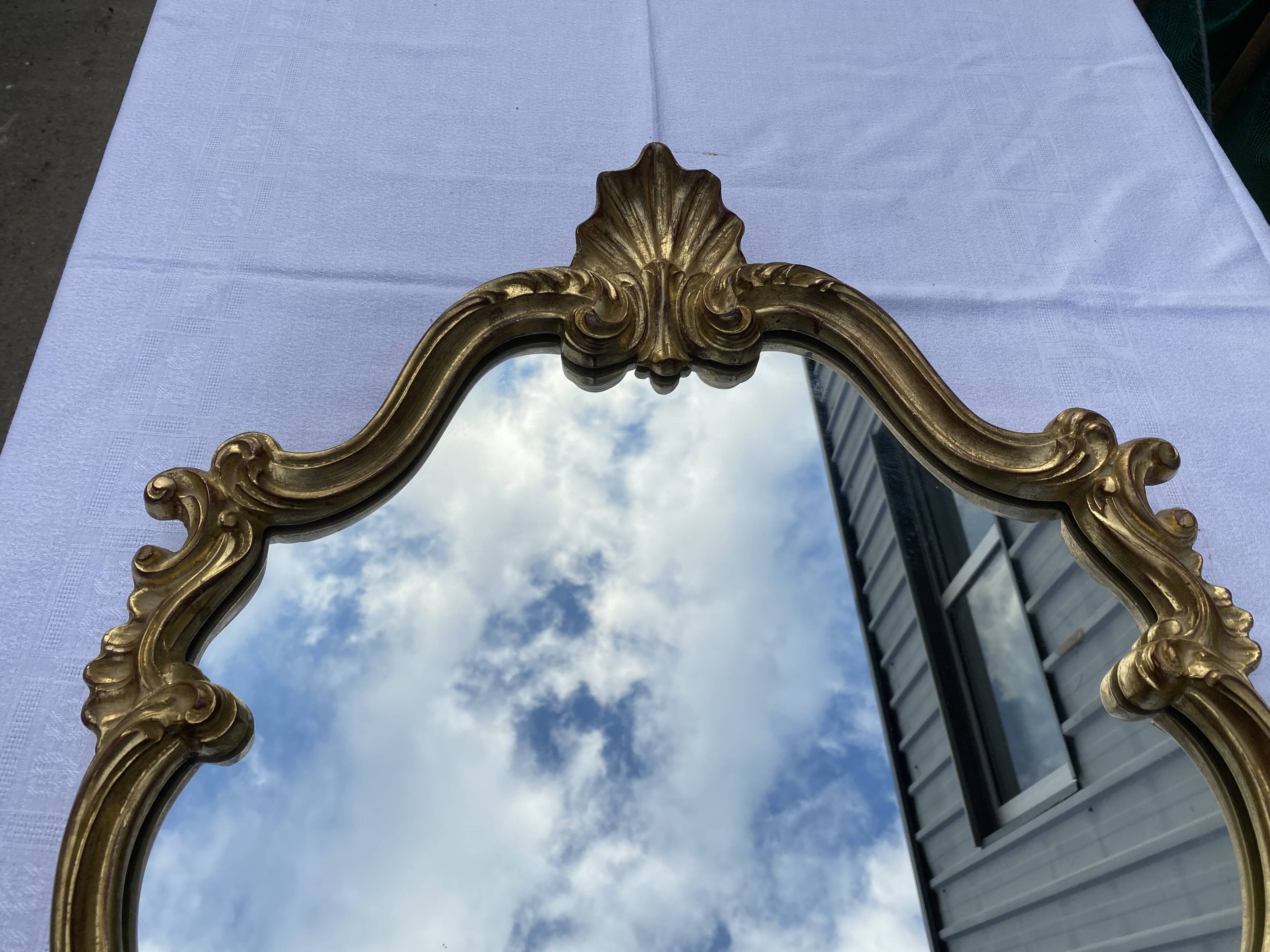 Louis XV-style golden mirror in good shell condition