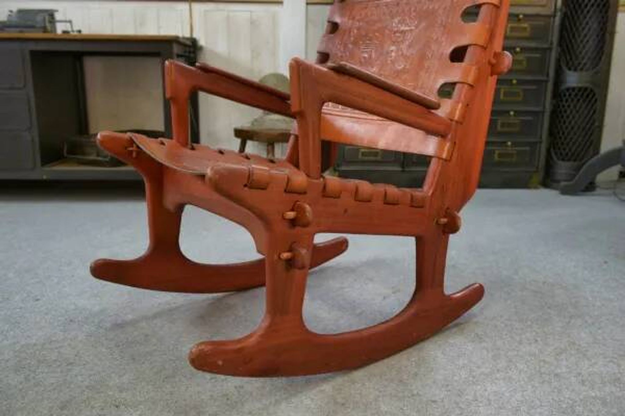 Armchair by Angel Pazmino in wood and red leather 1960's