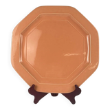 Octagonal plate in salmon pink, iron earth, Pagnossin, Italy, 20th century.