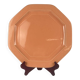Octagonal plate in salmon pink, iron earth, Pagnossin, Italy, 20th century.