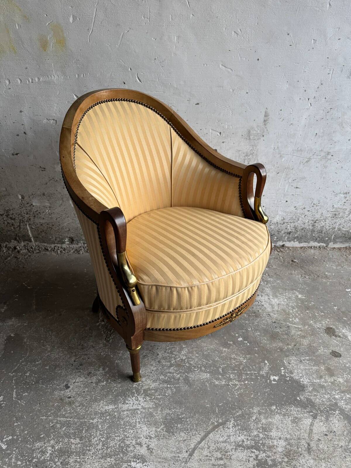 DeCoene antique wood writing desk with beige striped upholstered chair, brass-accented classic set