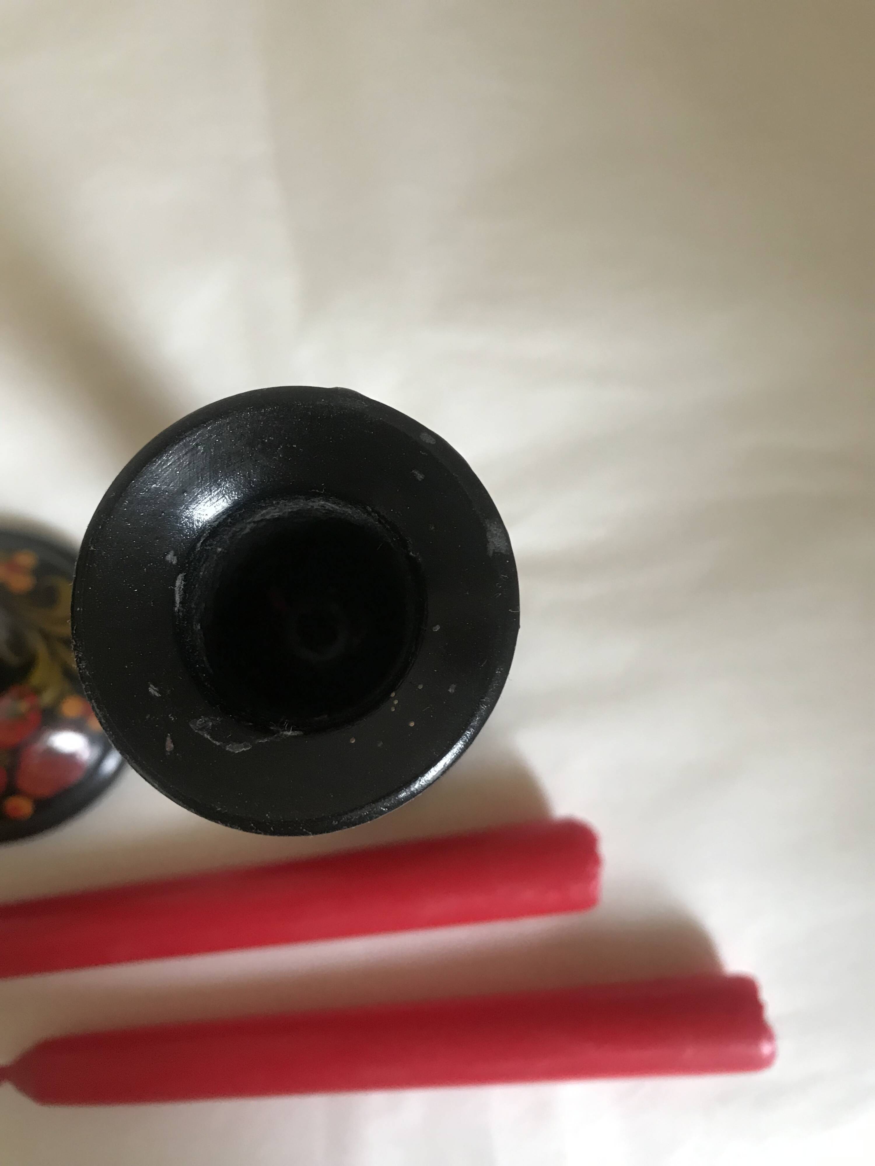 Varnished wooden candle holders