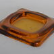 Empty amber glass pocket
