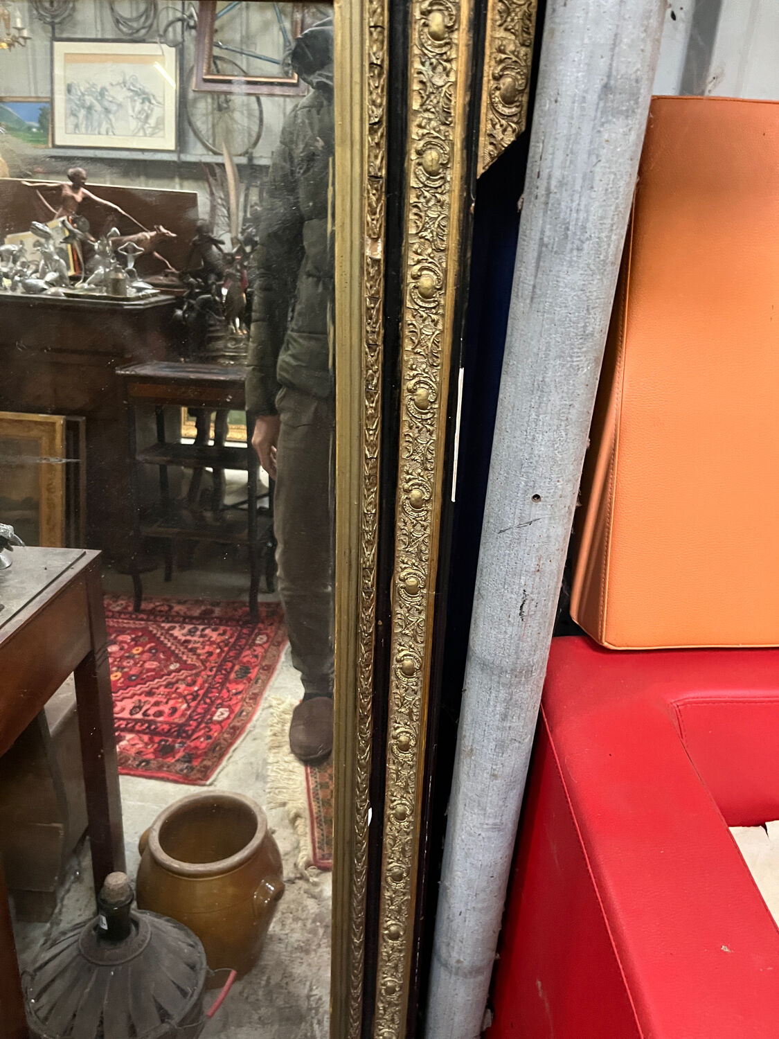Large antique gilt mirror with scroll and shell decoration, 144 cm