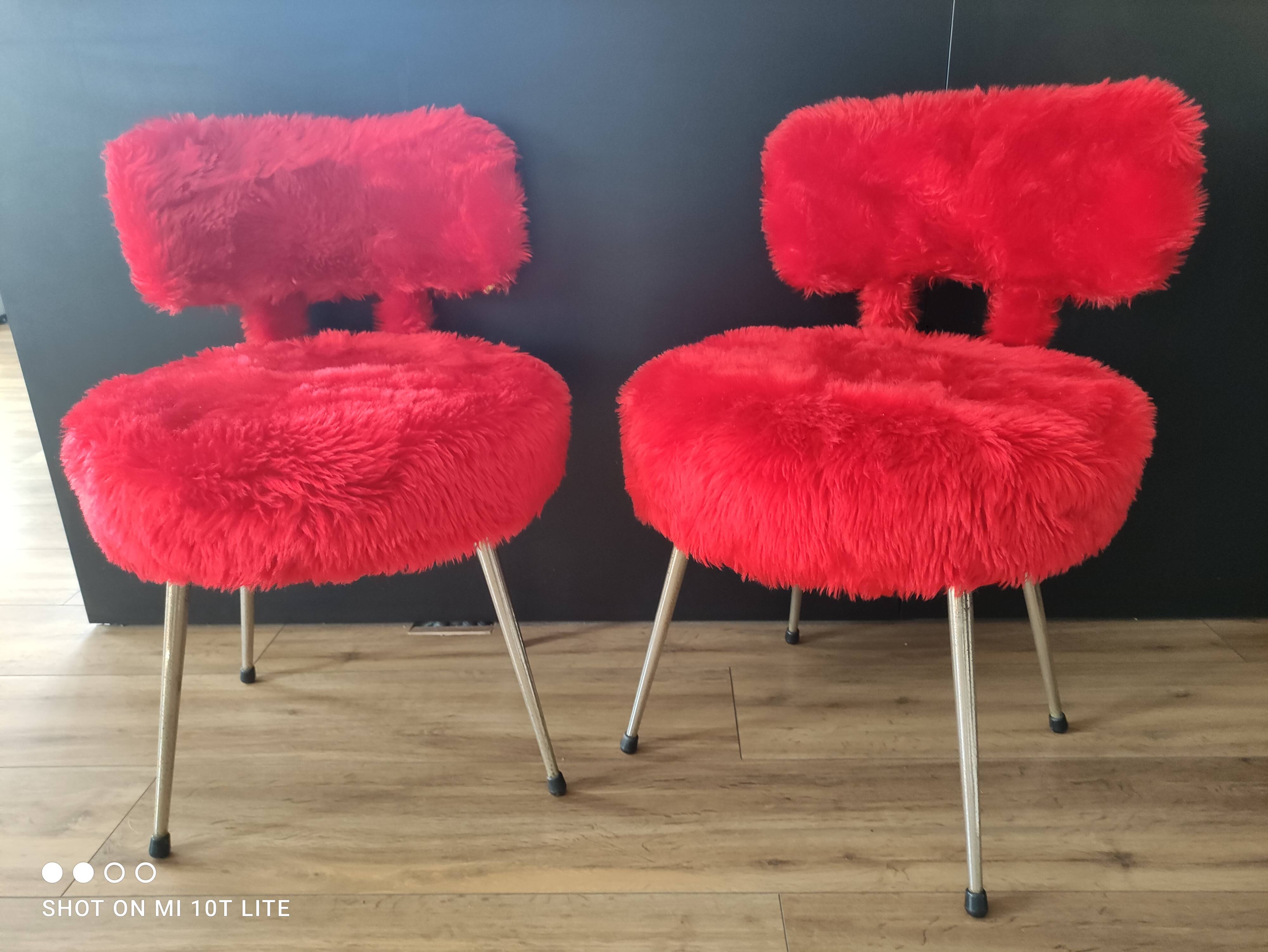 Pair of authentic cardinal red moumoute chairs from the 60s