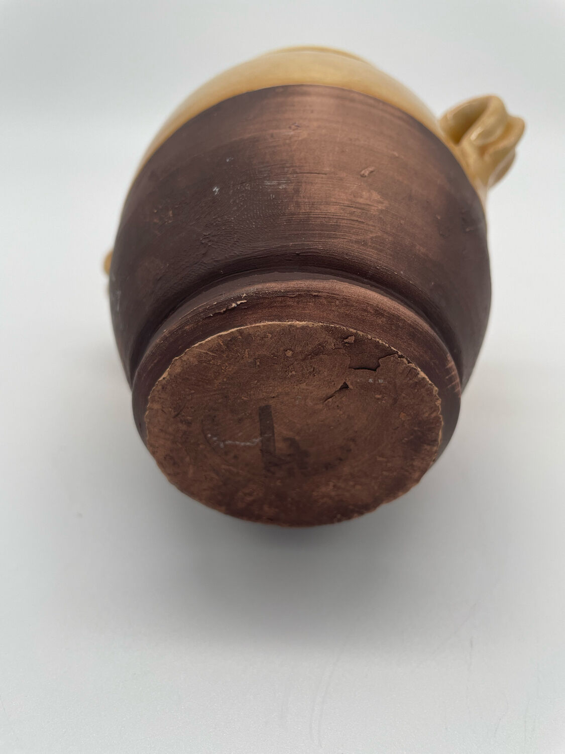 Varnished yellow terracotta confit pot