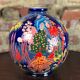 Art Deco style ball vase in glazed earthenware Jungle decoration Diameter 25 cm