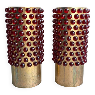 A pair of mid century brass and red glass marbles table lamps