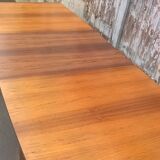 Extendable teak dining table