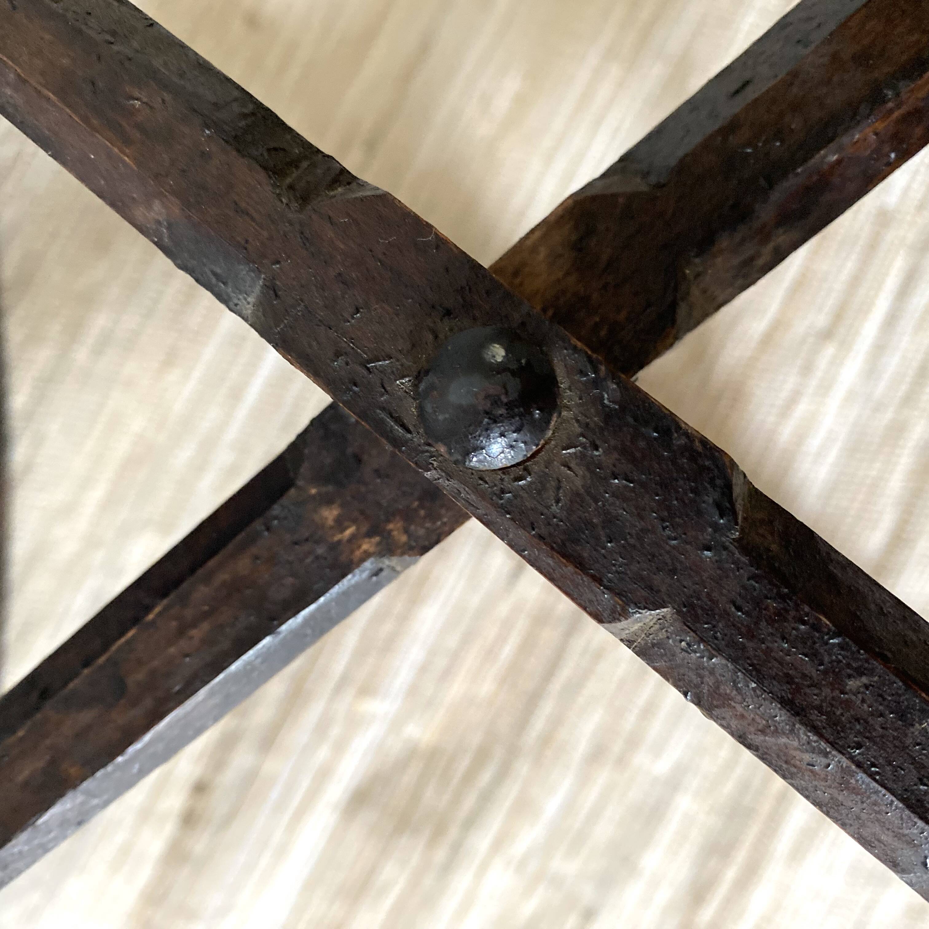 Folding slatted wooden stool