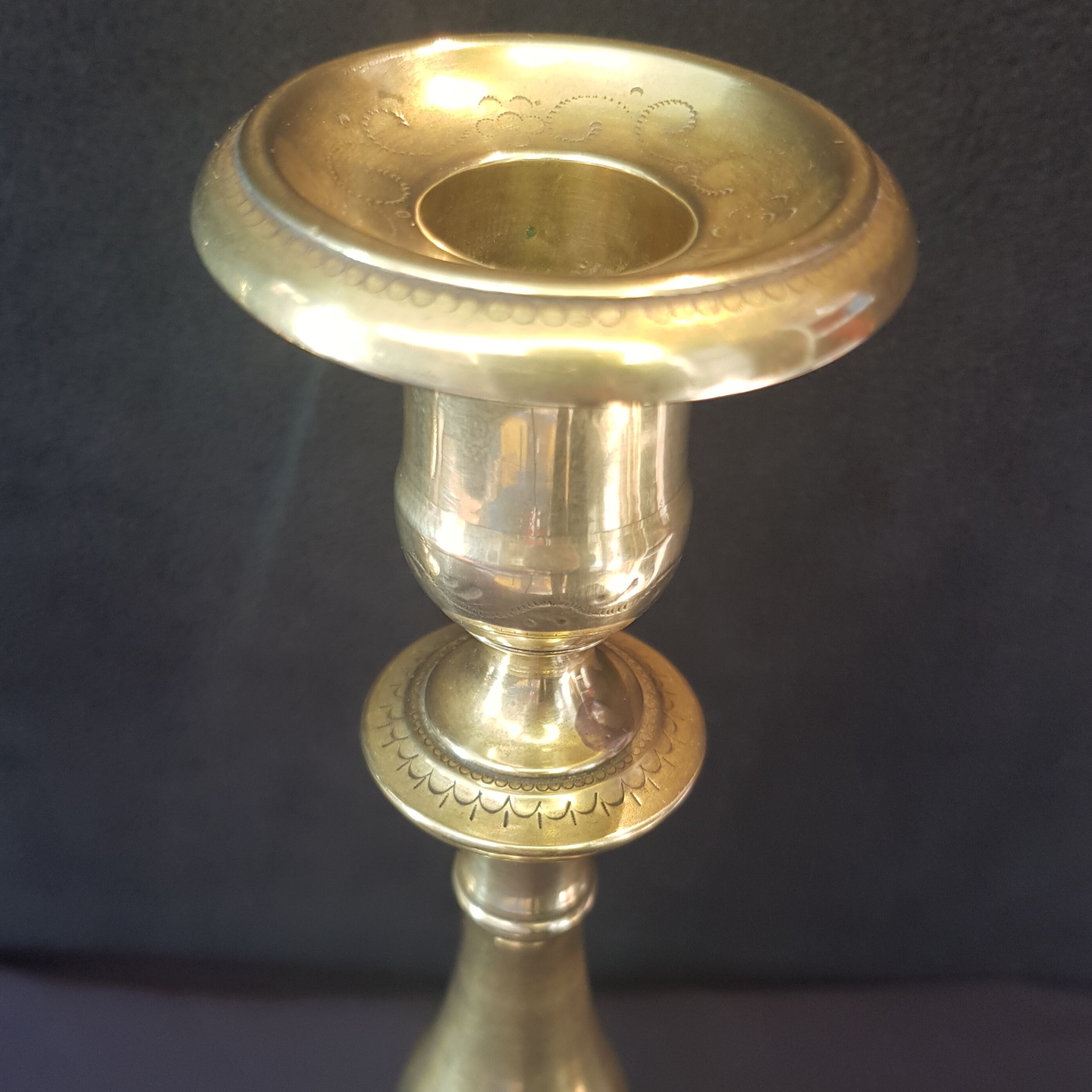 Chiseled gilded metal candlesticks