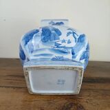 China circa 1920: porcelain vase with blue and white decoration