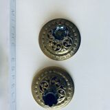 Pair of bronze candle holders signed