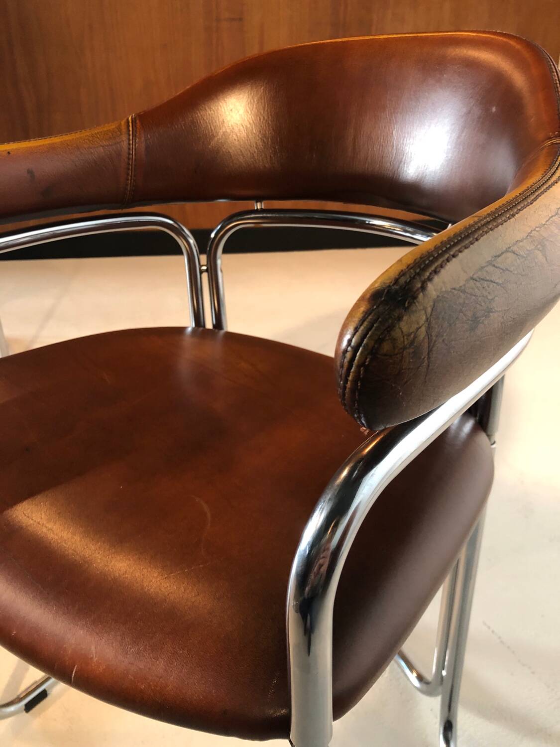 Pair of vintage armchairs, cognac leather and chrome steel 1970