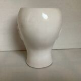 Man's head hide pot vase