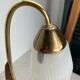 Pair of wall lights in brass, wood and opaline glass, 1950s/60s