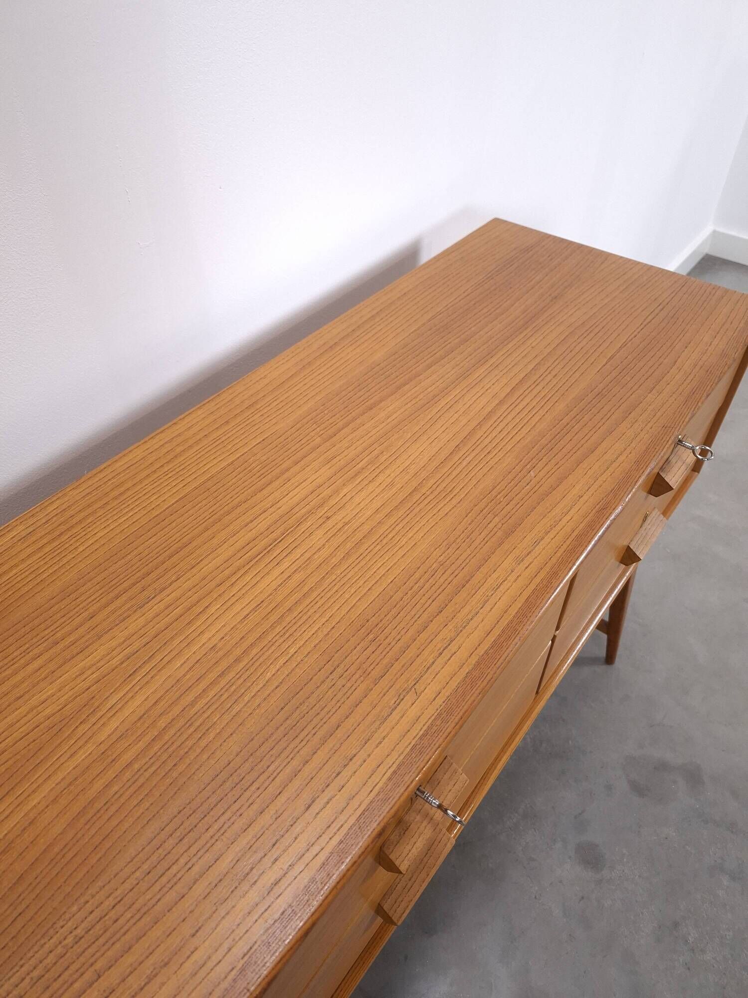 Vintage teak Danish chest of drawers with high slanted legs, side table, sideboard.