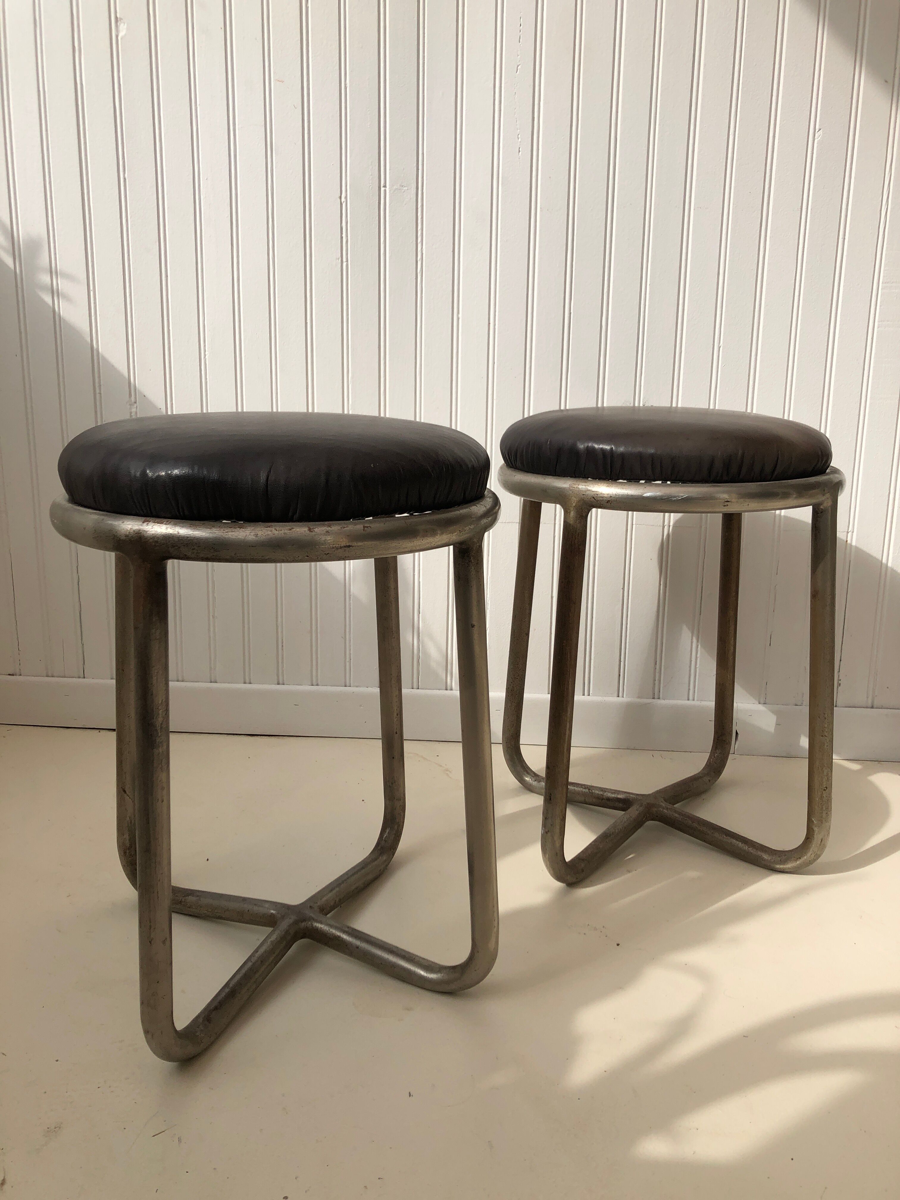 Pair of metal and leather stools