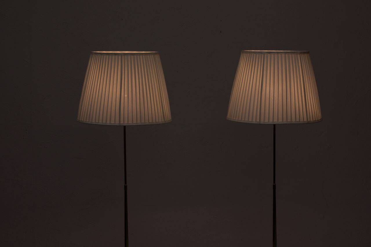 Pair of brass floor lamps by ASEA Belysning, Sweden, 1950s