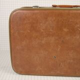 Cardboard and brown leather case