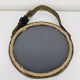 Mirror with handmade leather strapping