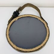 Mirror with handmade leather strapping