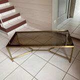 Neoclassical rectangular coffee table in gilded brass and glass top