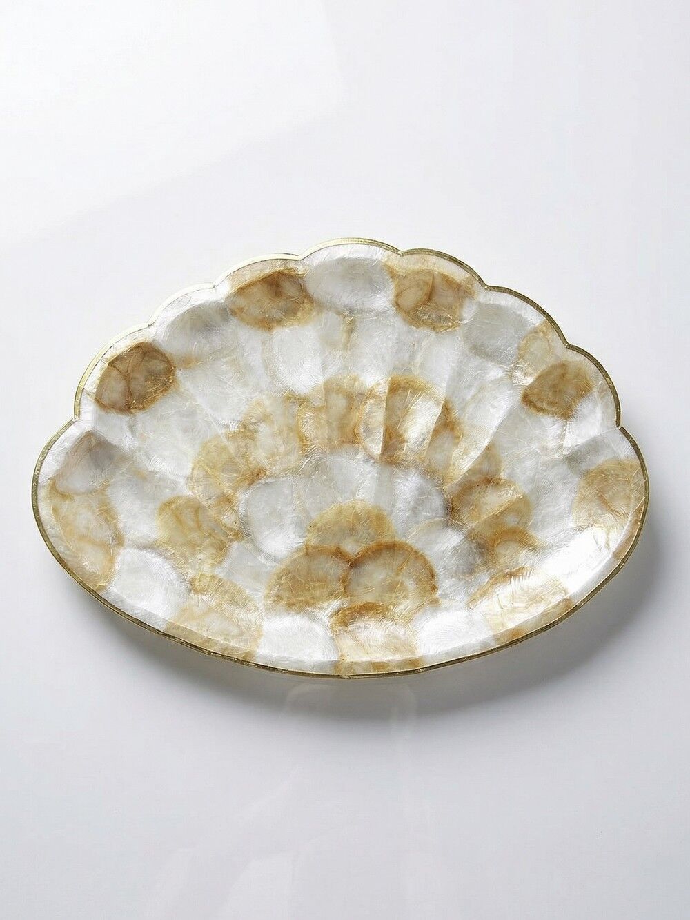 Large platter or shell-shaped catchall in capiz mother-of-pearl and vintage brass.