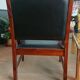 Colonial chair in teak and black leather