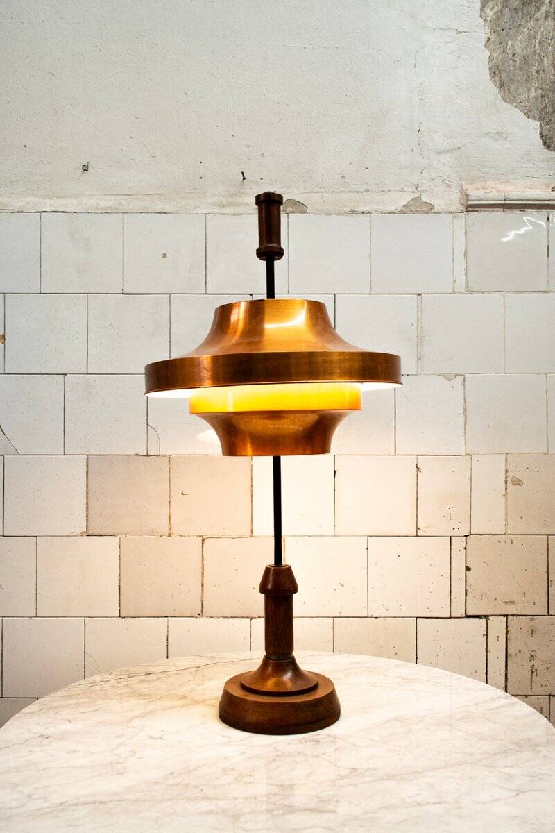 Table lamp with a wooden structure and adjustable copper shade by Stilnovo, 1950s.