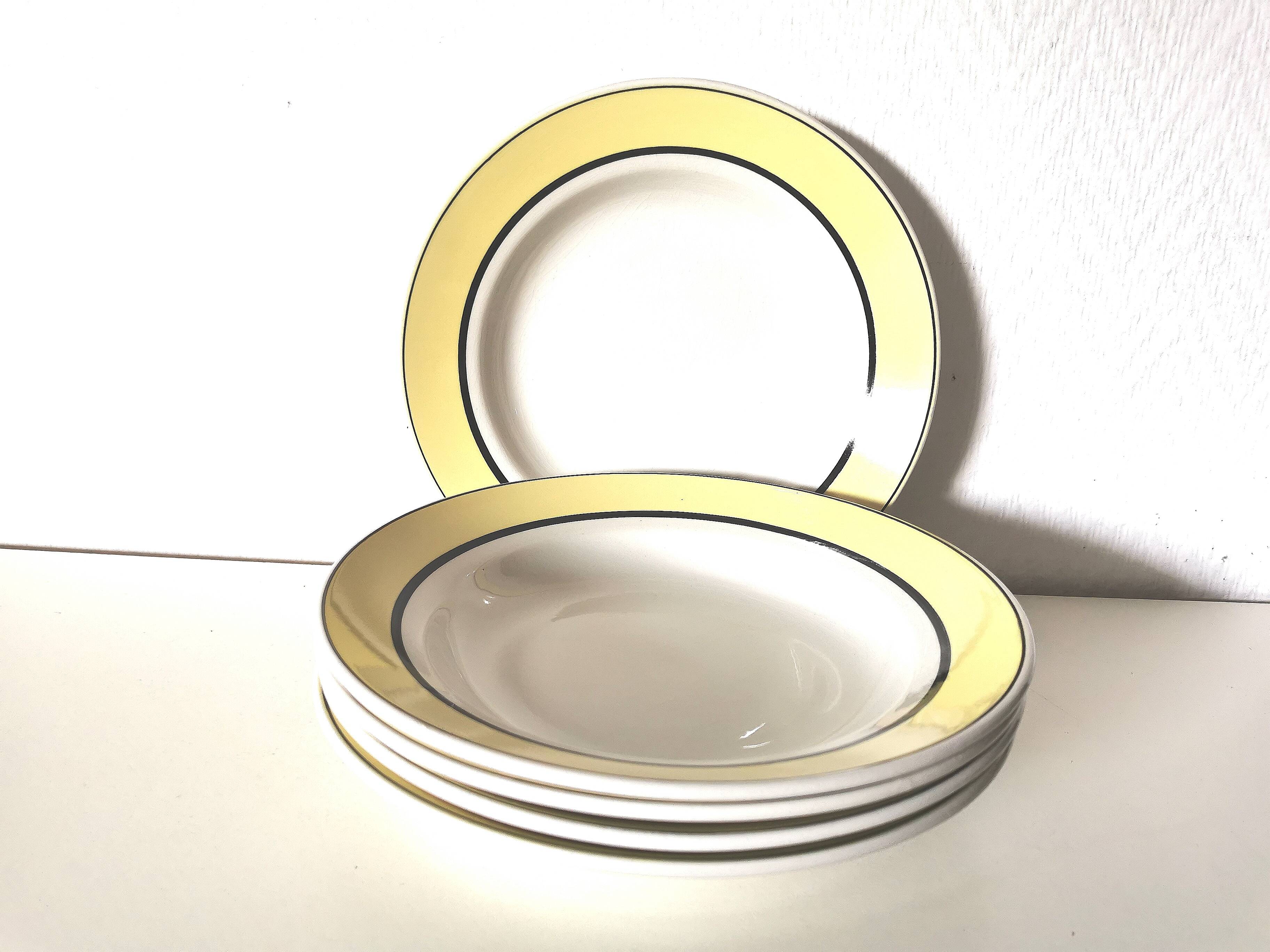 set of 5 soup plates / circle / yellow / black edges / Lunéville