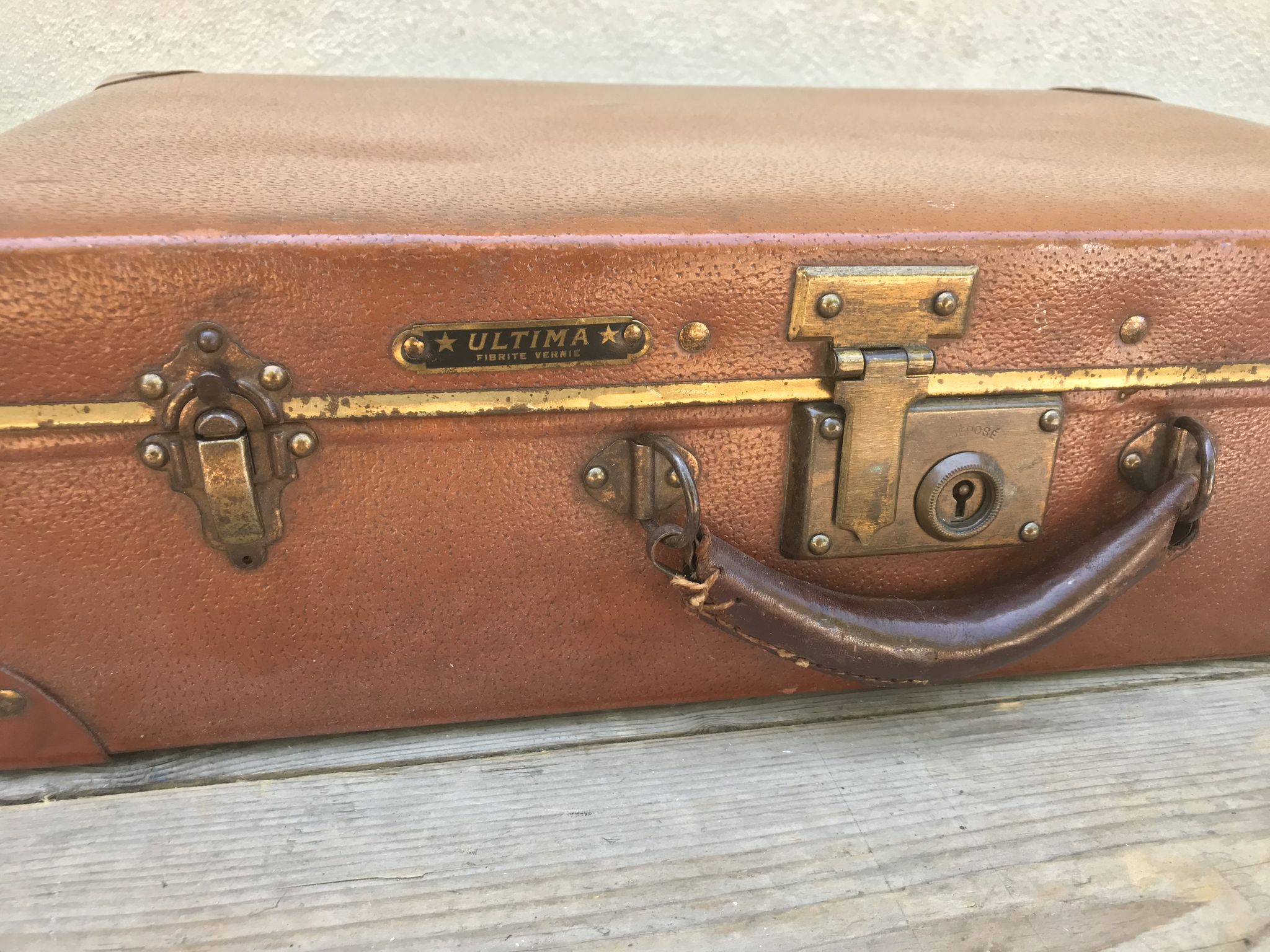 Old suitcase travel ultima brown fiber trunk