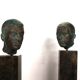 Ensemble de deux bustes en bronze sur stèles en granit par un élève de Georg Kolbe, 1925