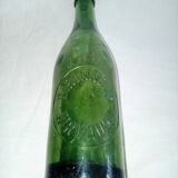 Set of three old bottles of green moulded glass