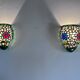 Pair of Tiffany-style wall sconces in colored glass mosaic