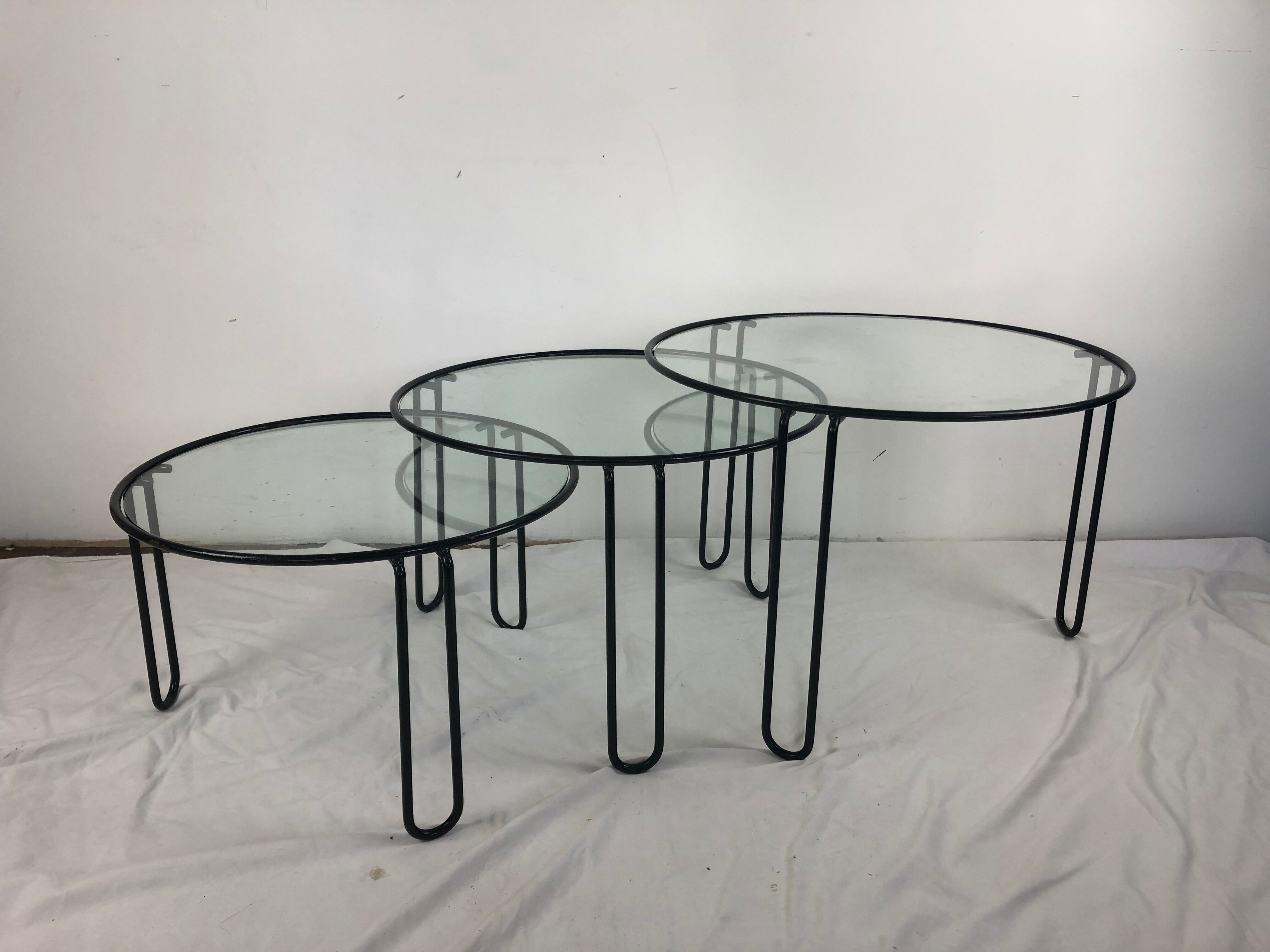 Metal and glass nesting coffee table 1970
