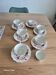 5 tea cups with saucers and 2 small pots, made in England.