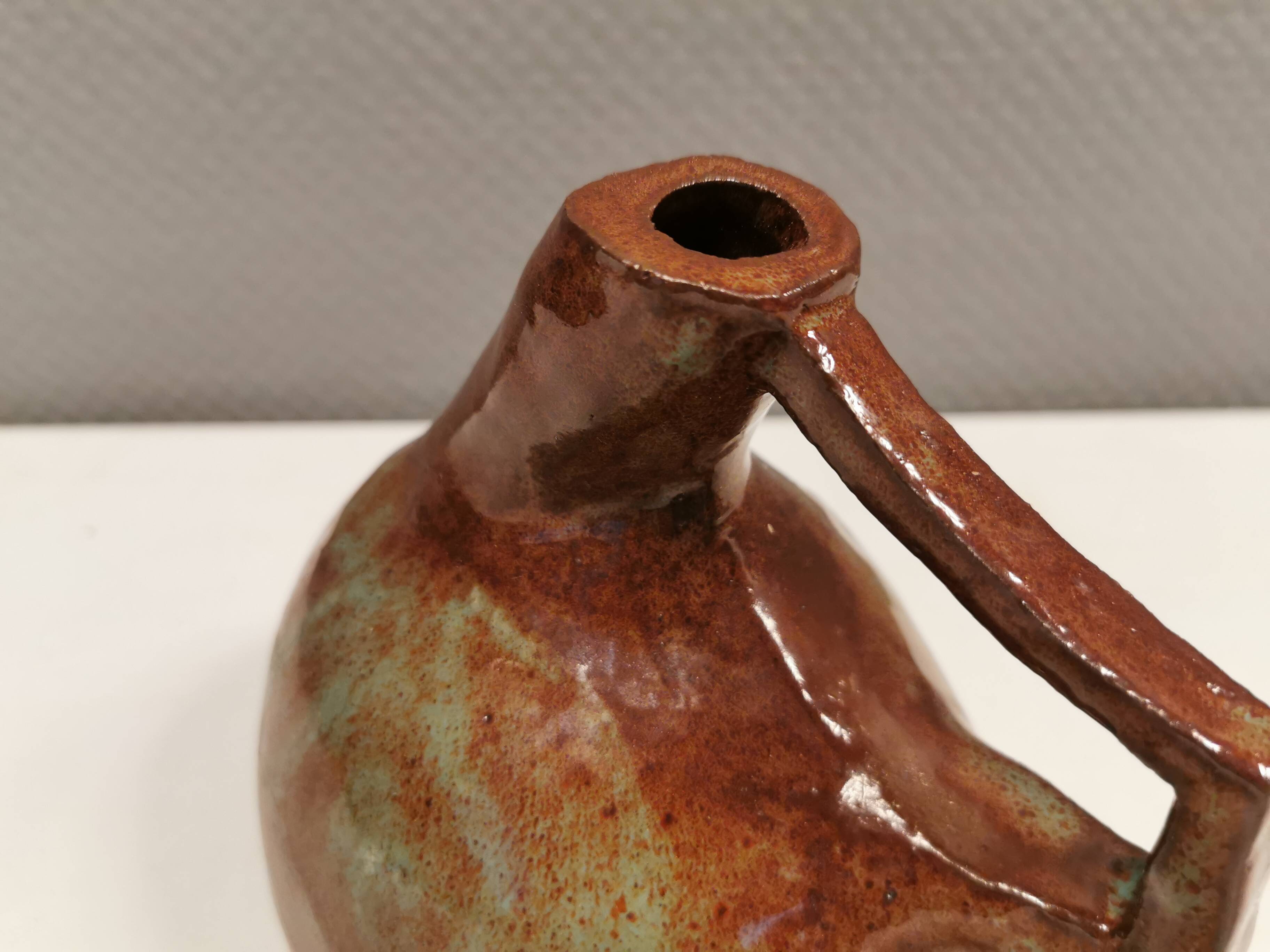 Ceramic jug/vase, Danish in beautiful earthy brown colours with light blue/green details.