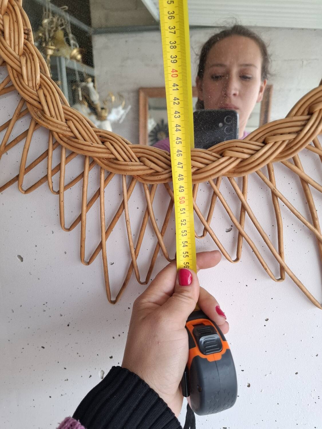 Vintage sun mirror in woven rattan