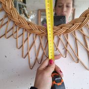 Vintage sun mirror in woven rattan