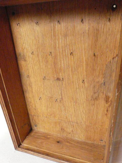 Old watchmaker's furniture wall display case