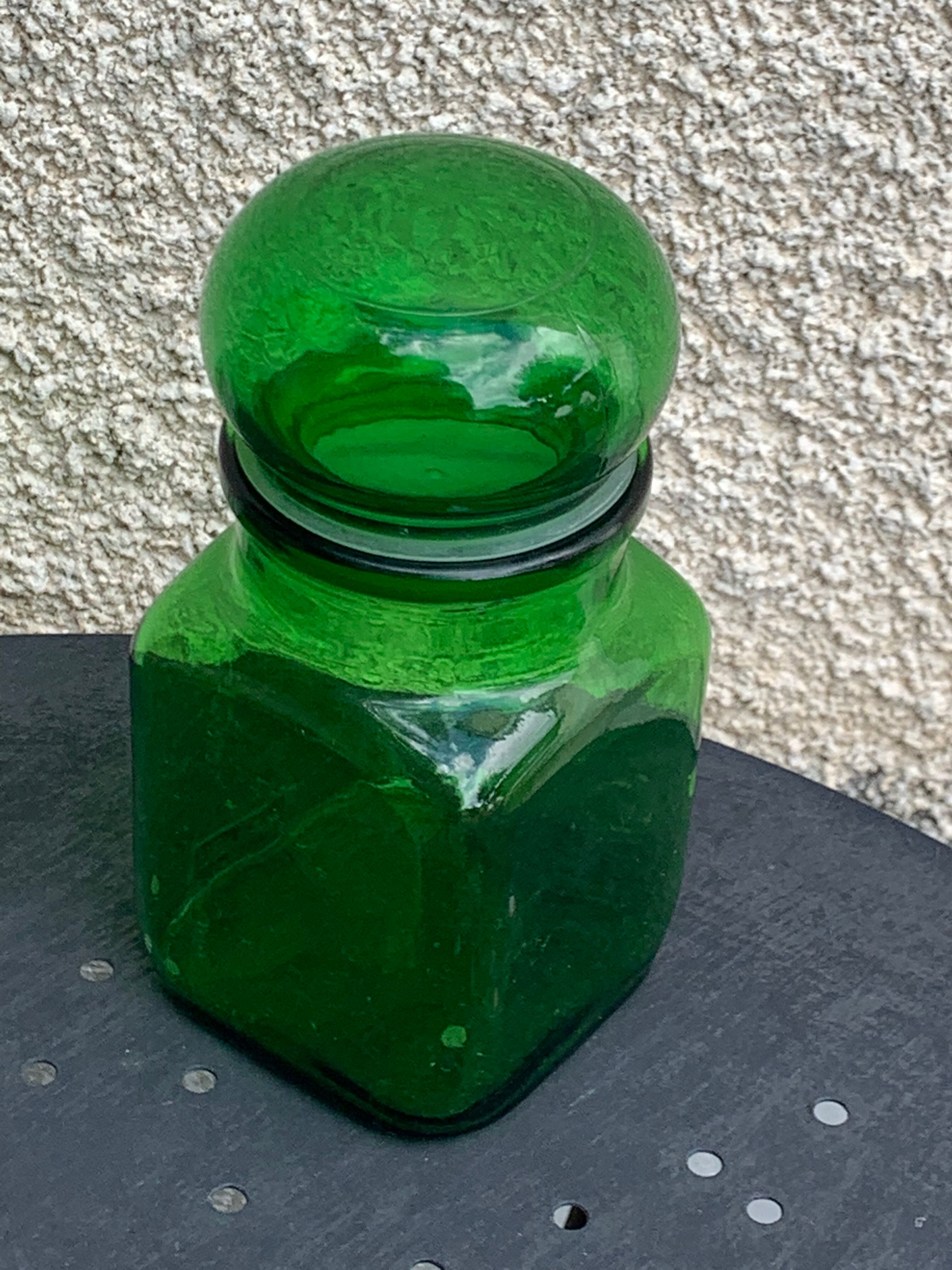 Two jars in green glass advertising vintage 1970
