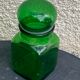 Two jars in green glass advertising vintage 1970